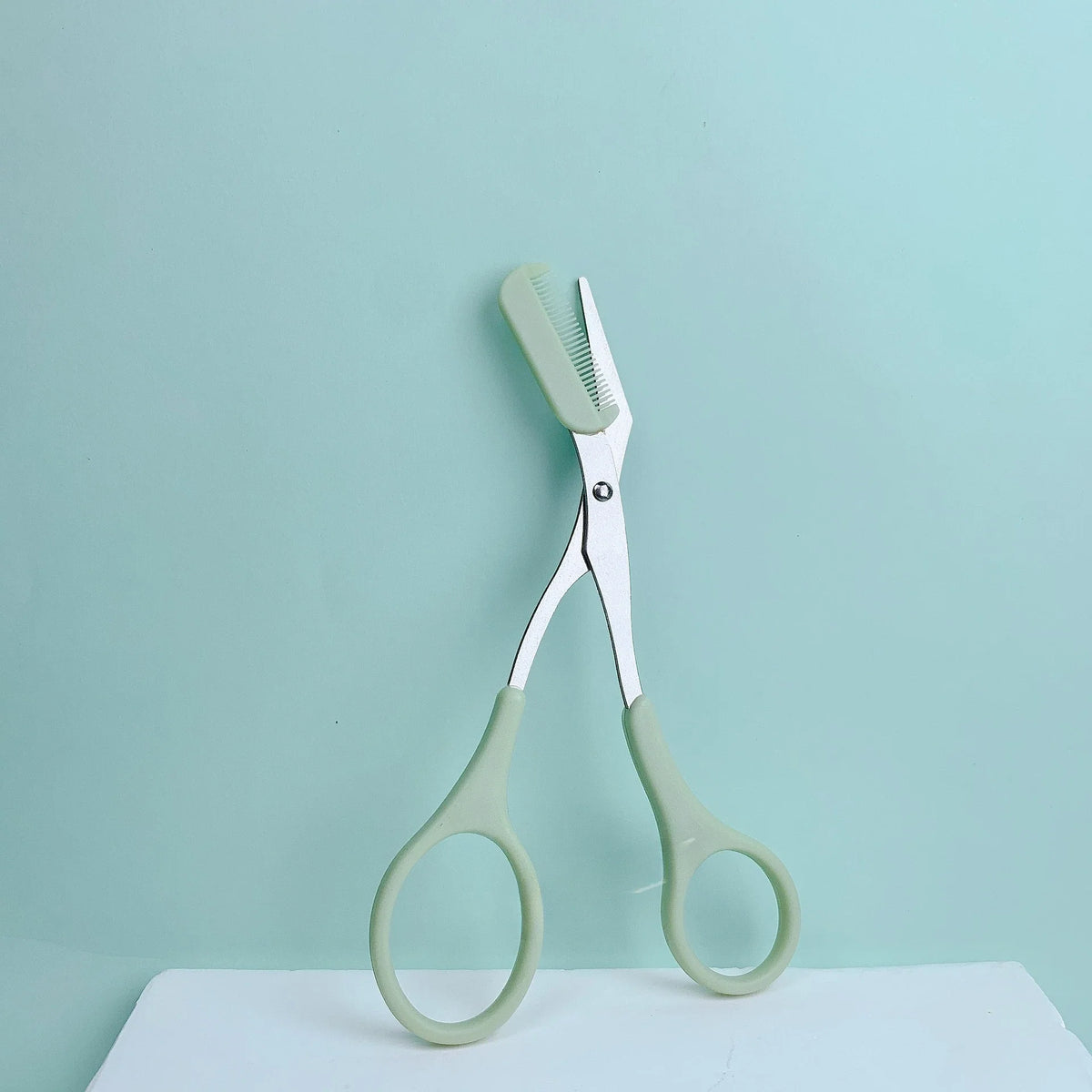 Pink Eyebrow Scissors with Built-In Comb – Stainless Steel