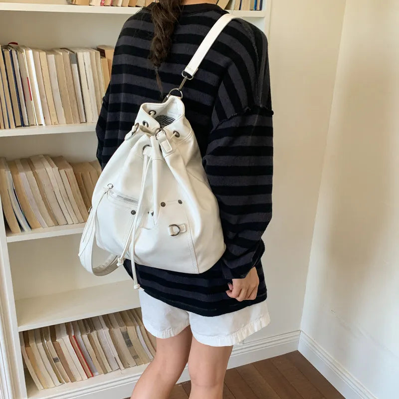 Nixie Patent Leather Drawstring Bucket Crossbody Bag