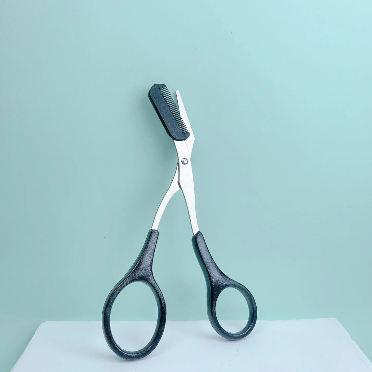 Pink Eyebrow Scissors with Built-In Comb – Stainless Steel