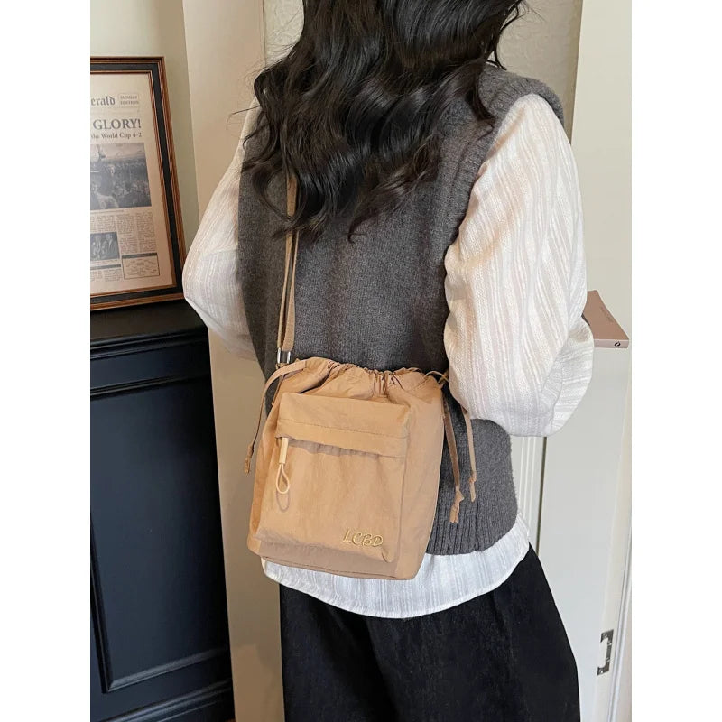 Nixie Lightweight Drawstring Bucket Bag – Crossbody