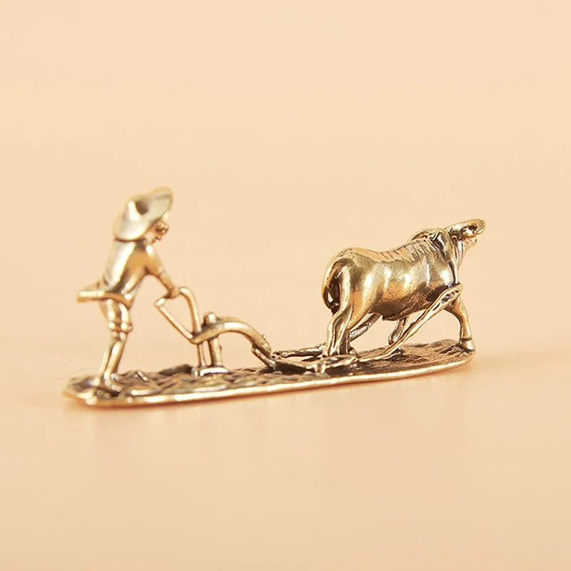 Antique Brass Tea Pet Figurine – Farmer & Cow Collectible