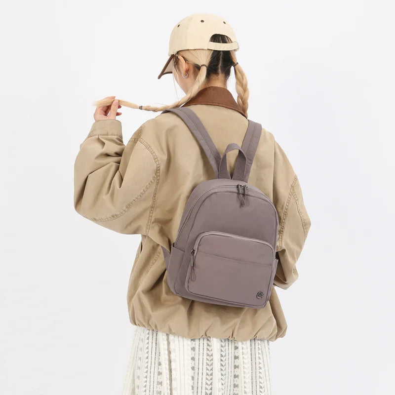 Nixie Lightweight Nylon Mini Backpack – Travel & School Bag