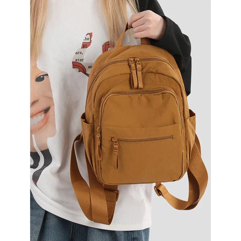 Nixie Lightweight Water-Repellent Nylon Small Backpack