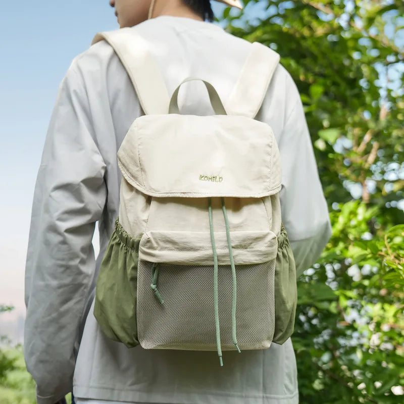 Nixie Lightweight Waterproof Travel Backpack 20–35L