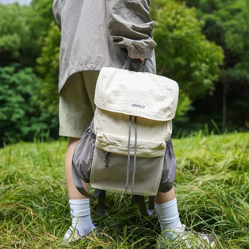 Nixie Lightweight Waterproof Travel Backpack 20–35L