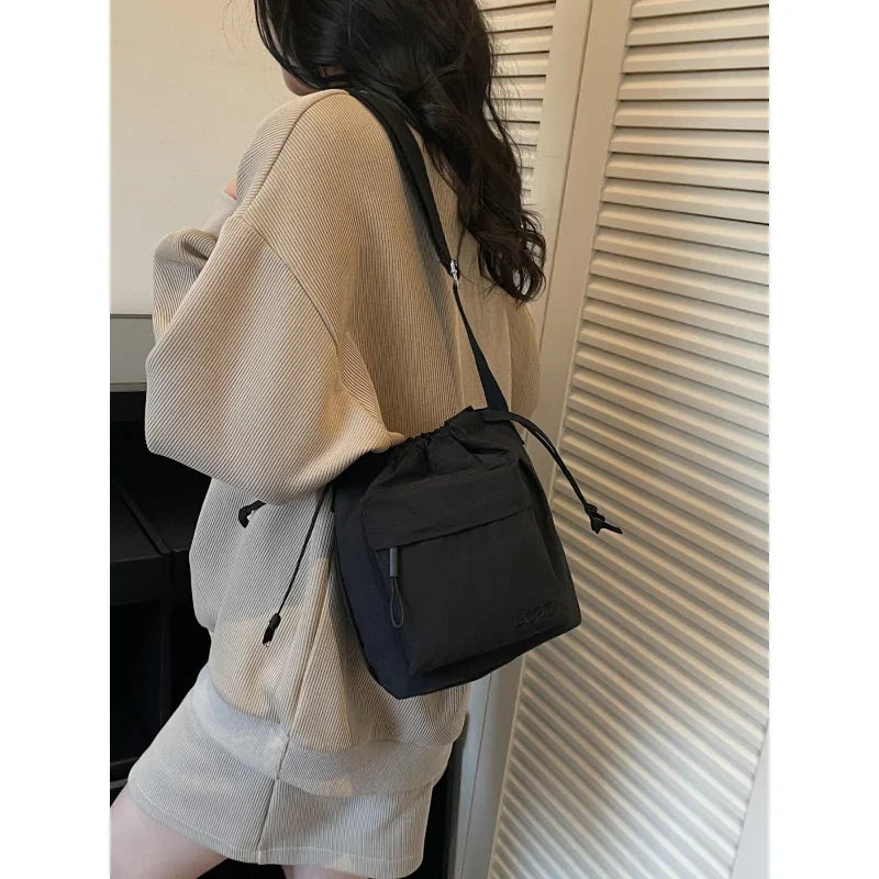 Nixie Lightweight Drawstring Bucket Bag – Crossbody