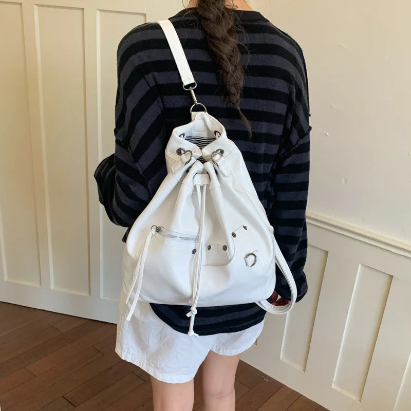 Nixie Patent Leather Drawstring Bucket Crossbody Bag