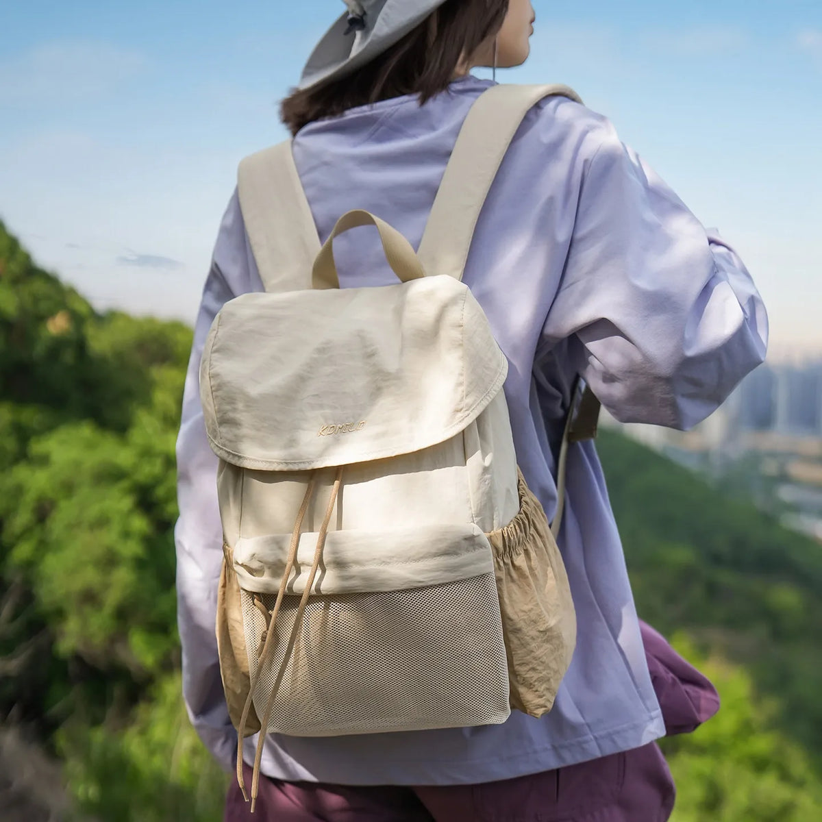 Nixie Lightweight Waterproof Travel Backpack 20–35L