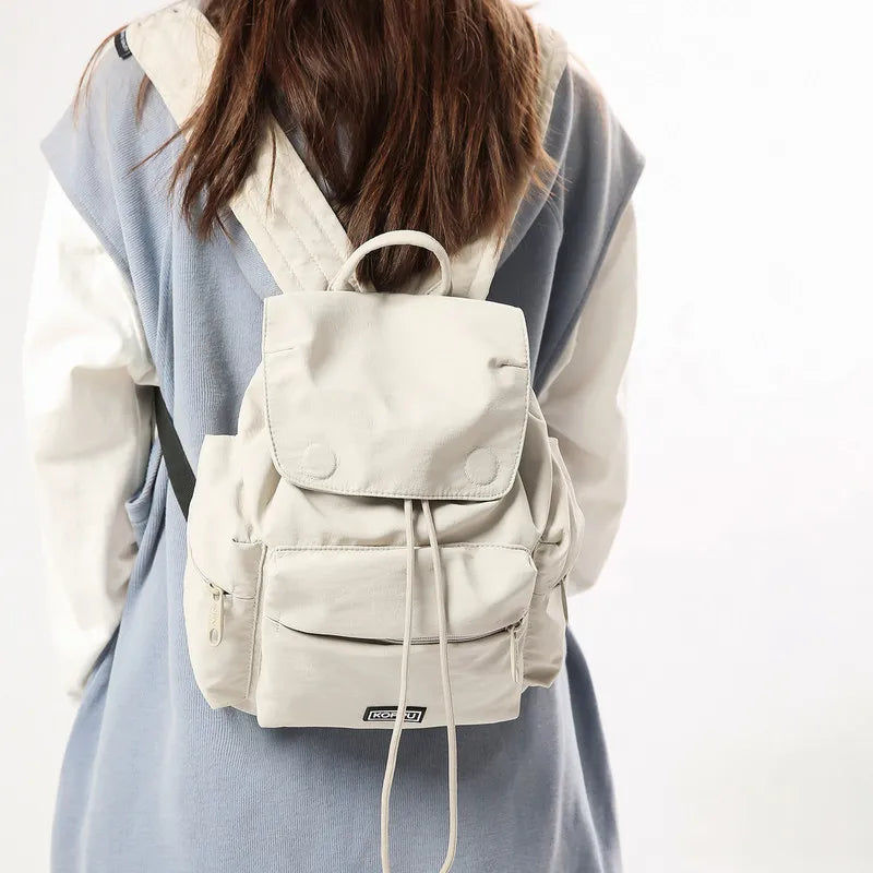 Nixie Women's Lightweight Waterproof Backpack for Travel & School