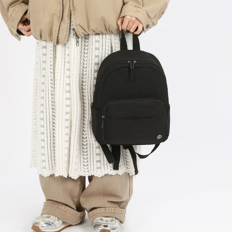 Nixie Lightweight Nylon Mini Backpack – Travel & School Bag