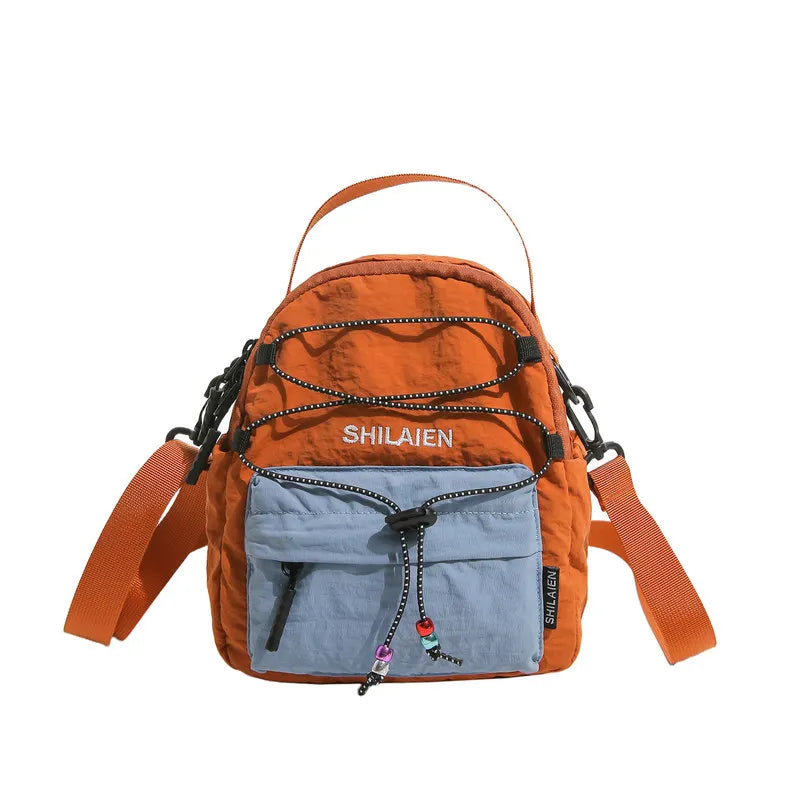 Nixie Women's Lightweight Multi-Pocket Crossbody Travel Bag