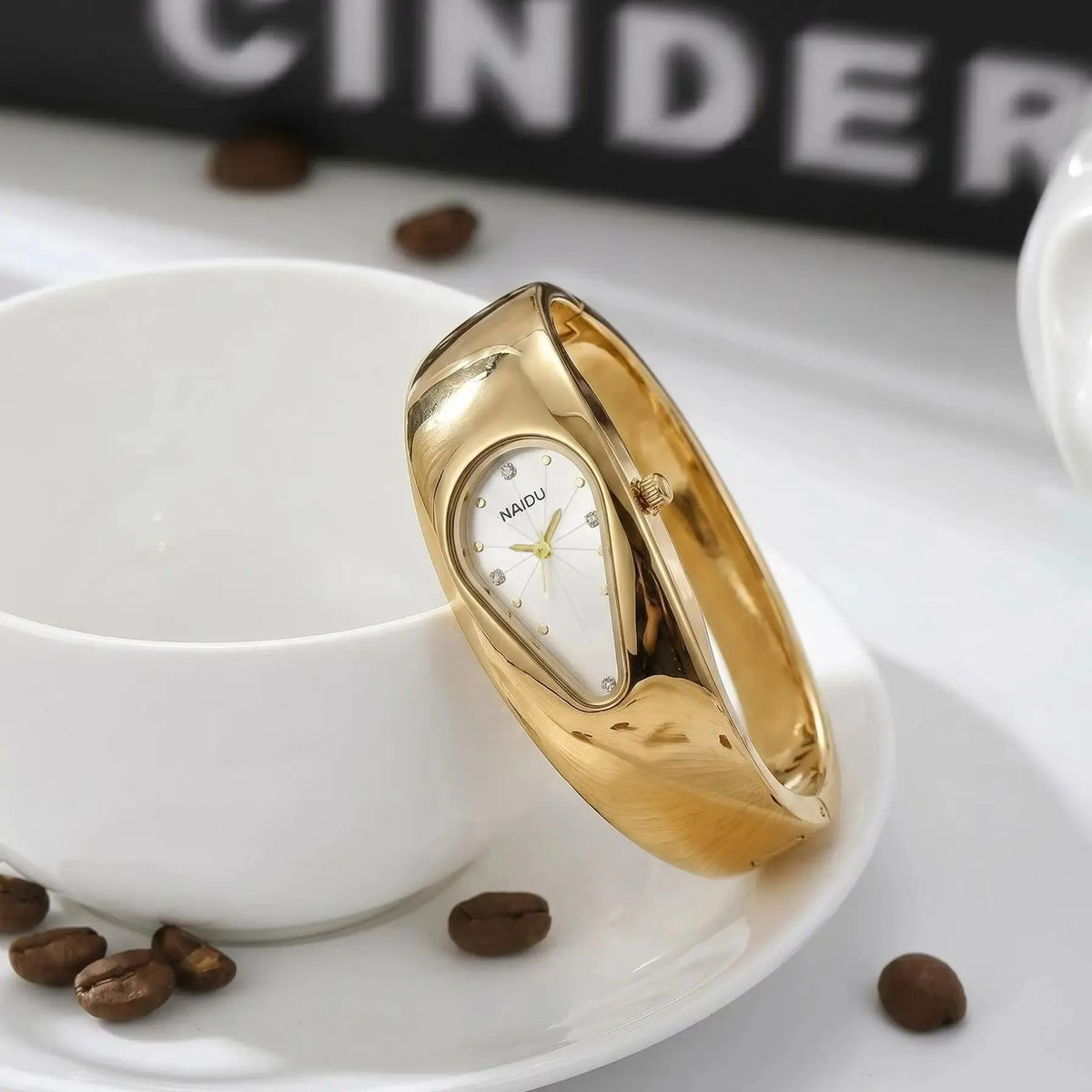 Naidu Women's Gold Bracelet Quartz Watch – Elegant Bangle Style