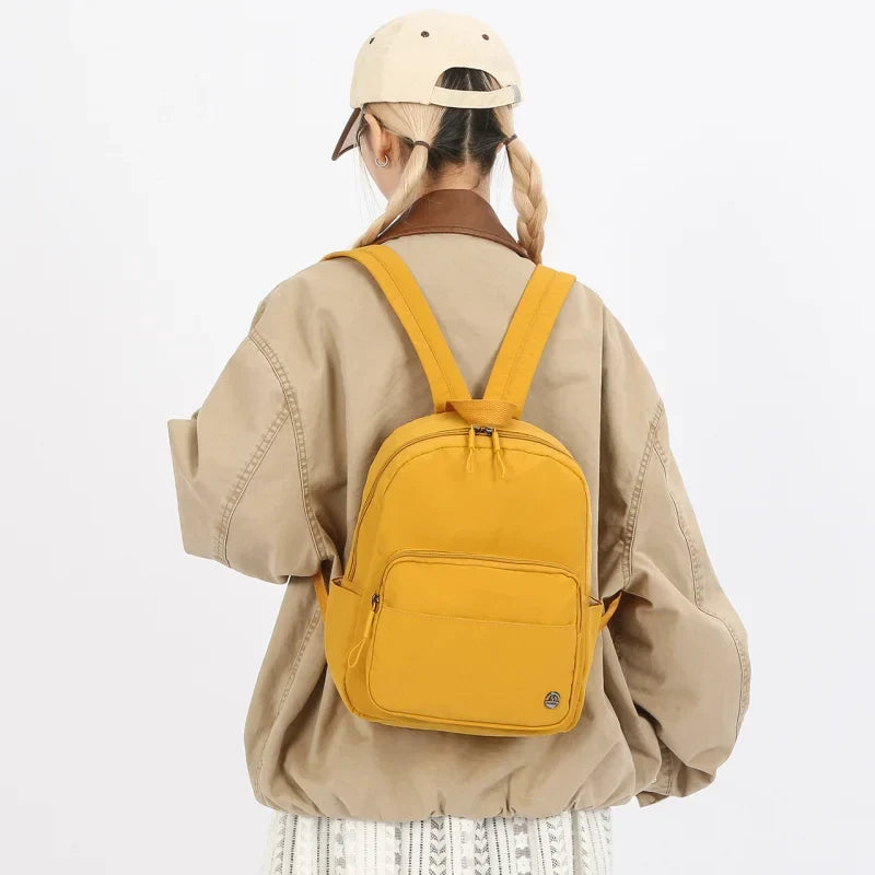 Nixie Lightweight Nylon Mini Backpack – Travel & School Bag