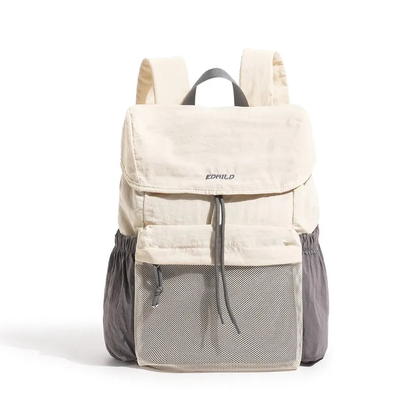 Nixie Lightweight Waterproof Travel Backpack 20–35L