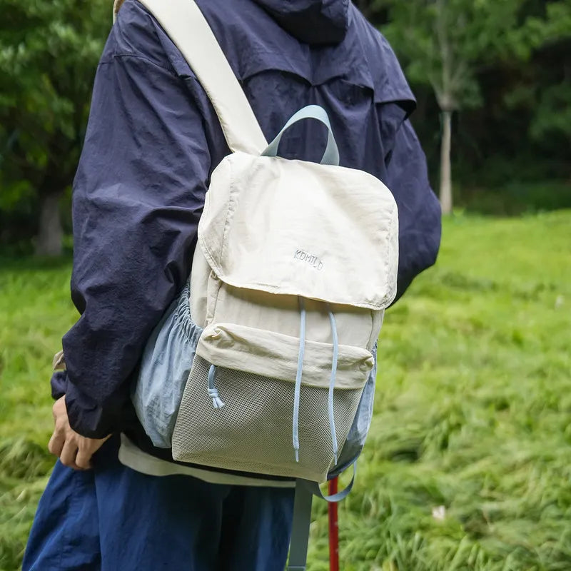 Nixie Lightweight Waterproof Travel Backpack 20–35L