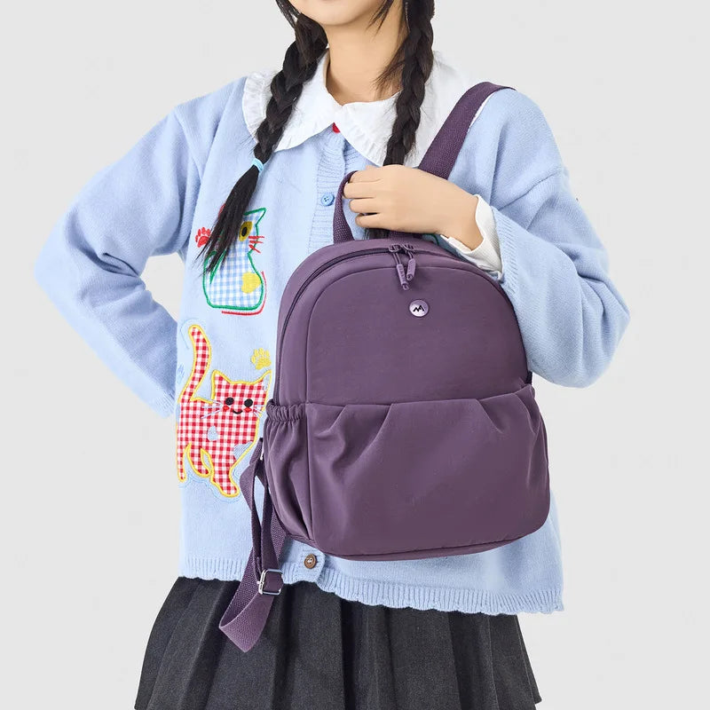 Nixie Mini Travel Backpack – Lightweight Water-Resistant Nylon
