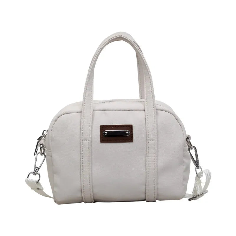 Nixie Women's Canvas Bowling Bag – Pillow Crossbody Handbag