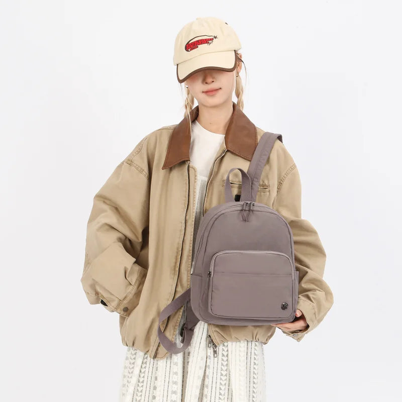 Nixie Lightweight Nylon Mini Backpack – Travel & School Bag