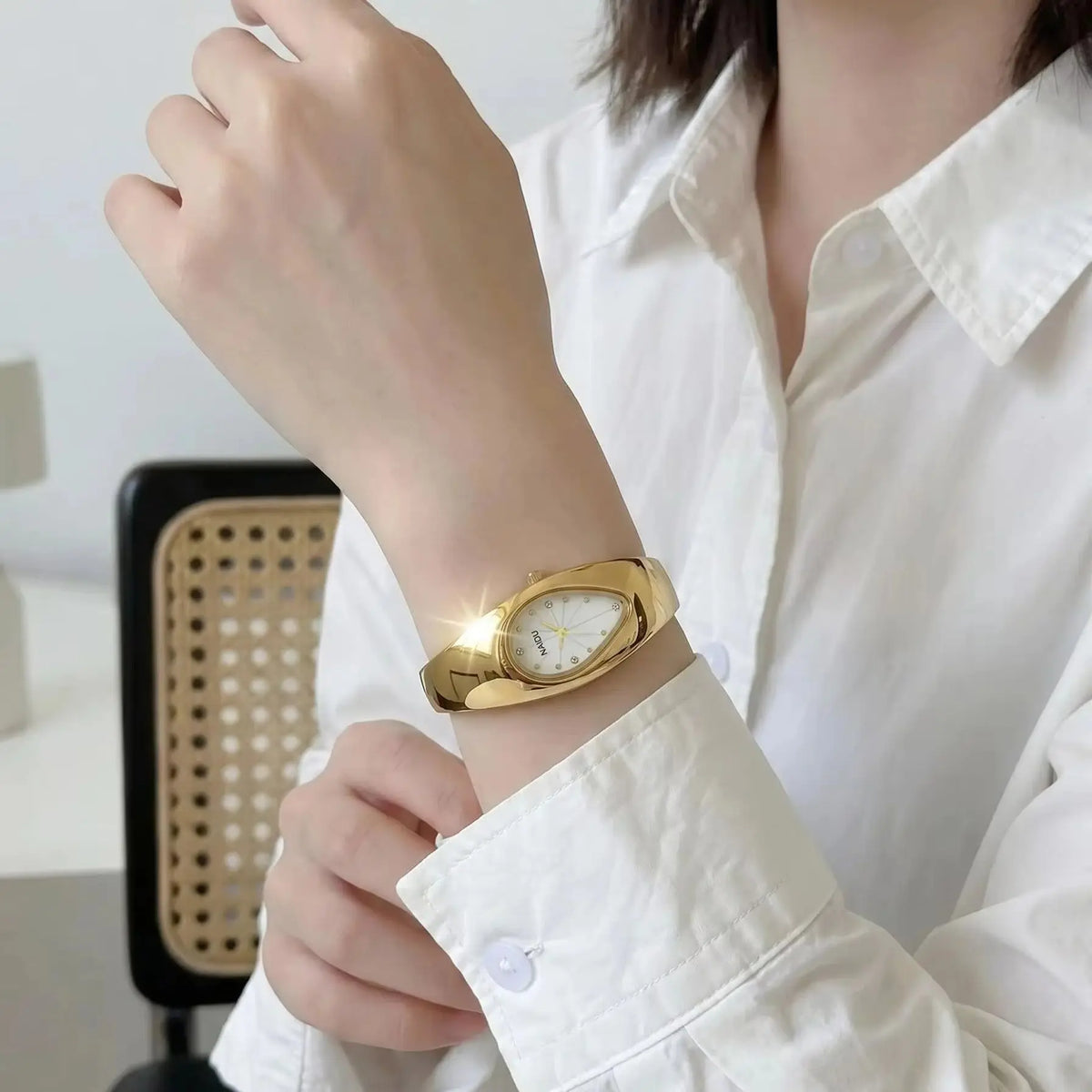 Naidu Women's Gold Bracelet Quartz Watch – Elegant Bangle Style
