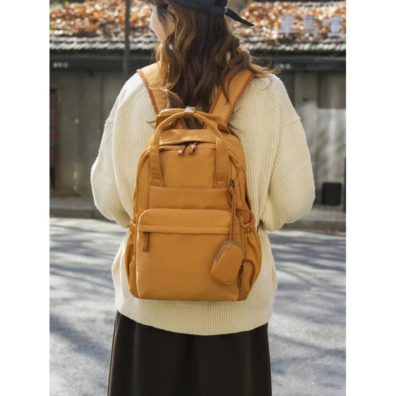 Nixie Lightweight Nylon Backpack – Laptop, Travel & Commute